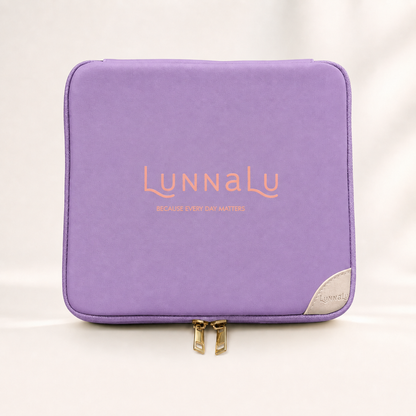 LunnaLu Large Period Organiser in violet, closed, with a printed peach logo, cream corner tab and gold zip pulls