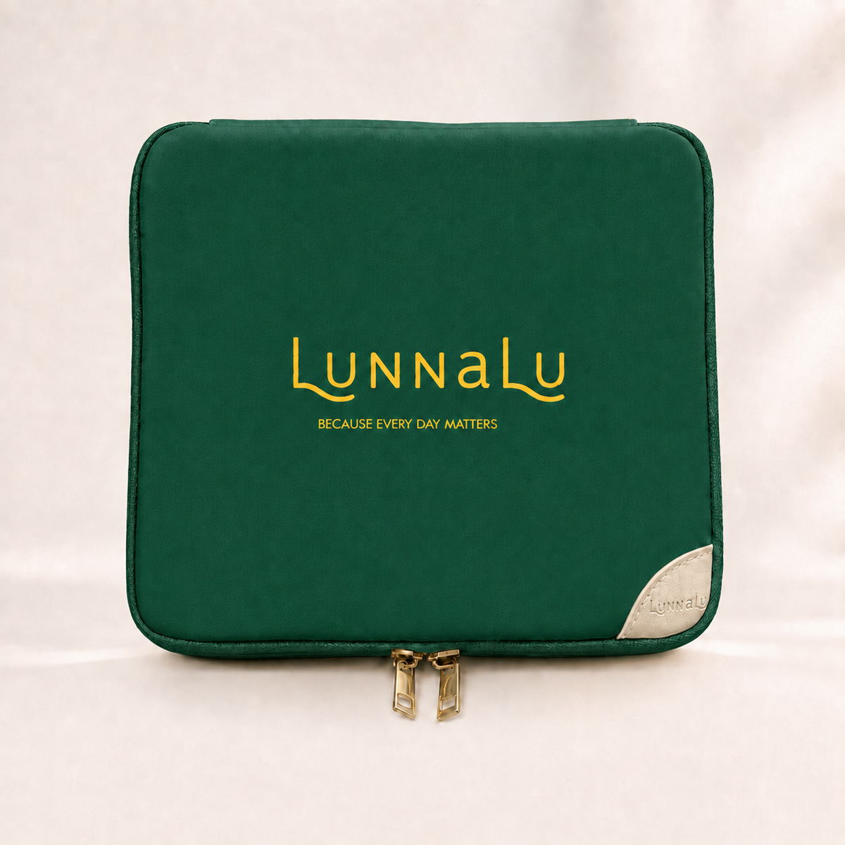 LunnaLu Large Period Organiser in forest green, closed, with a printed gold logo, cream corner tab and gold zip pulls