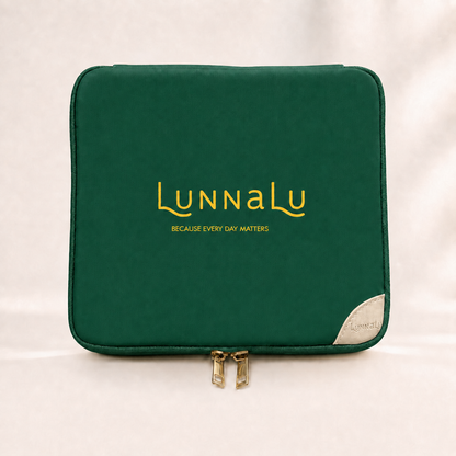 LunnaLu Large Period Organiser in forest green, closed, with a printed gold logo, cream corner tab and gold zip pulls