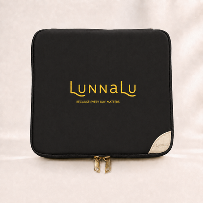 LunnaLu Large Period Organiser in black, closed, with a printed gold logo, cream corner tab and gold zip pulls