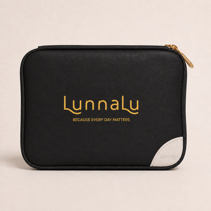LunnaLu Small Period Organiser in black, closed, with a printed gold logo, cream corner tab and gold zip pulls
