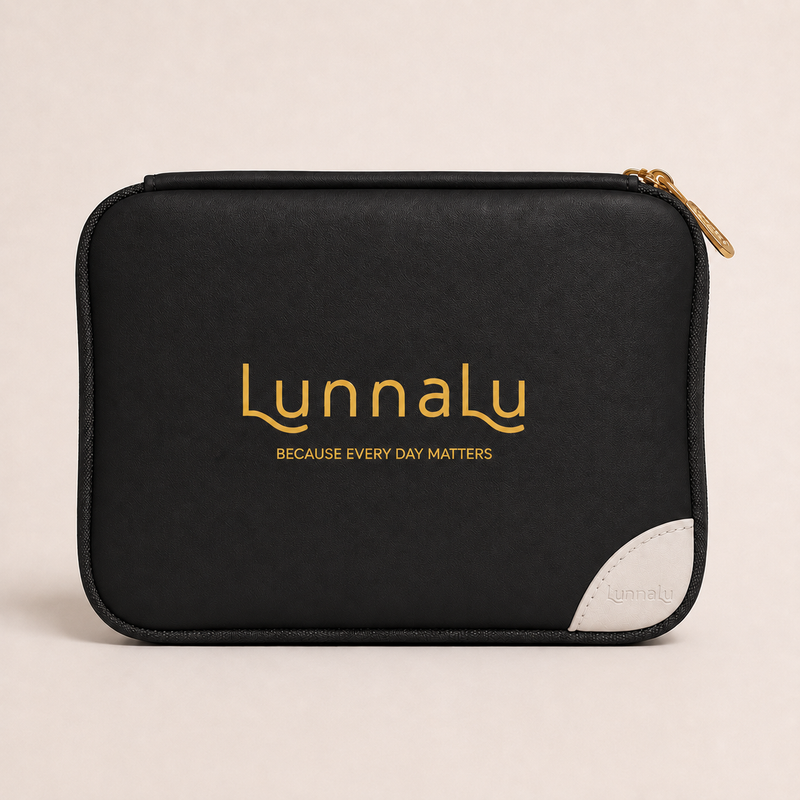 LunnaLu Small Period Organiser in black, closed, with a printed gold logo, cream corner tab and gold zip pulls